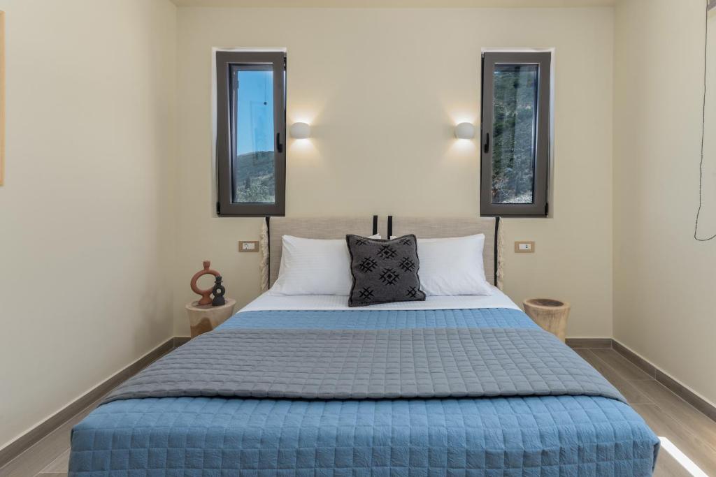 Postel nebo postele na pokoji v ubytování J&C Luxury Villa