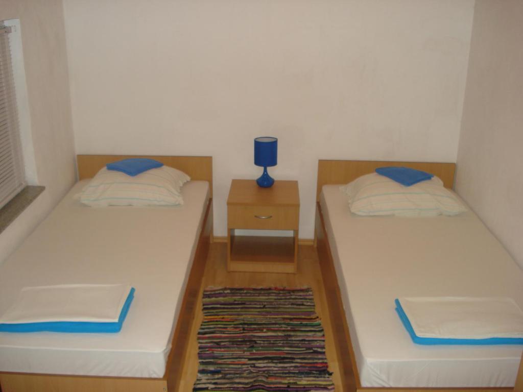 Postel nebo postele na pokoji v ubytování Hostel Hercegovina