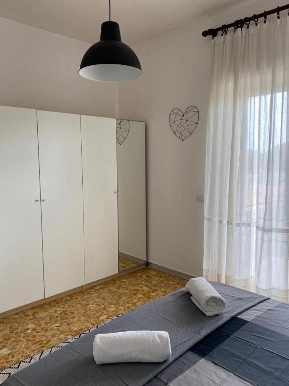 a room with a yoga mat on the floor next to a window at Pisana 247 St Peter in Rome
