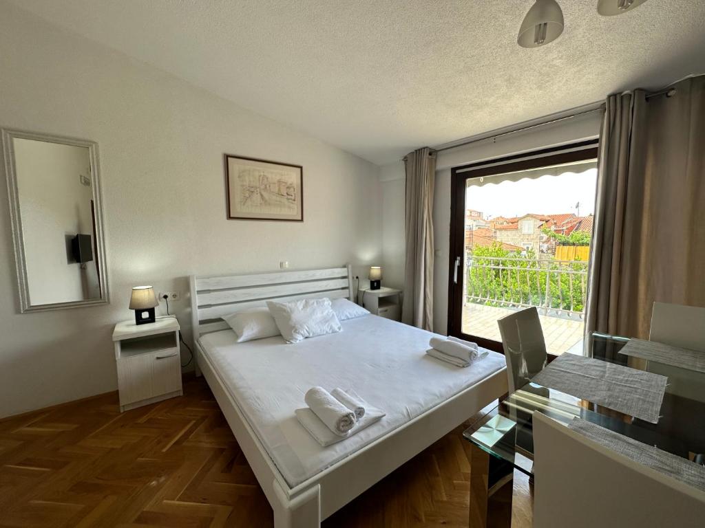 Postel nebo postele na pokoji v ubytování Villa Dante