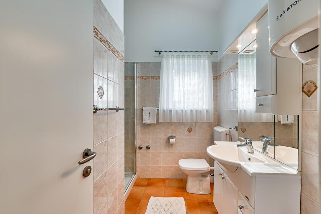 Koupelna v ubytování Apartments Lara