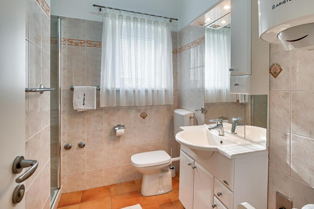 Koupelna v ubytování Apartments Lara