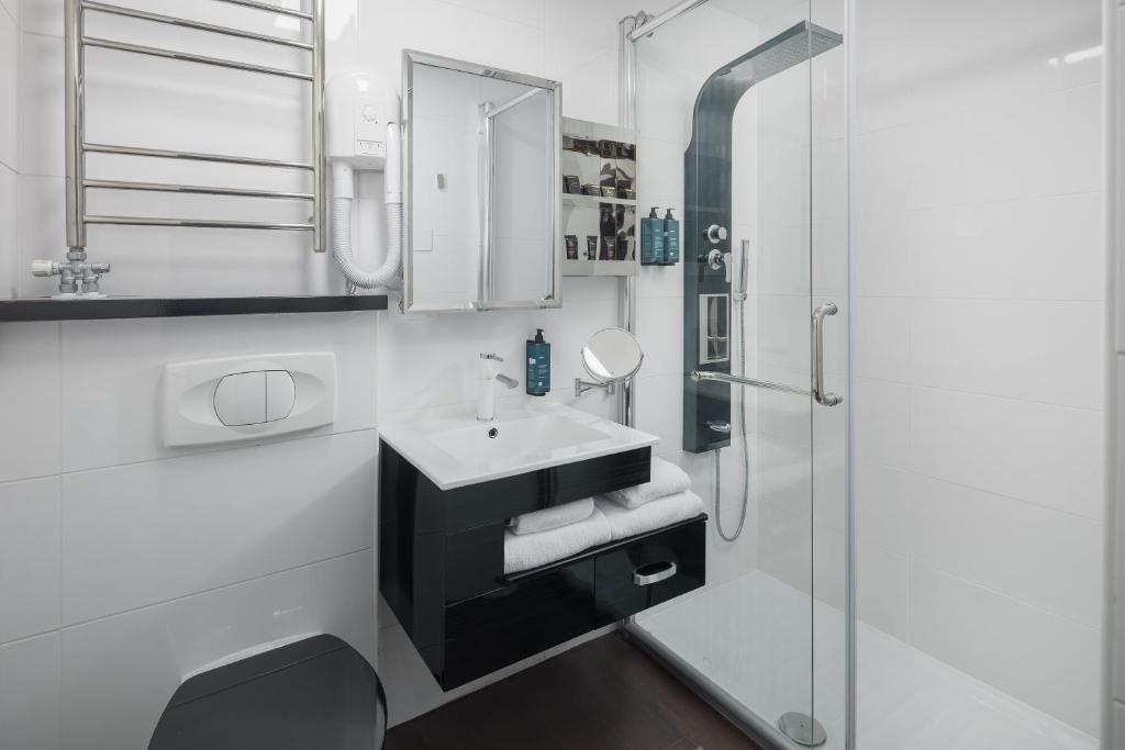Koupelna v ubytování Hotel Tomi