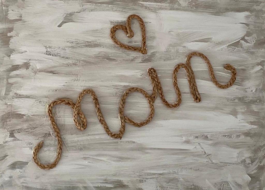a group of pretzels forming the word love on a table at Haffkrug Beach Bungalow in Scharbeutz
