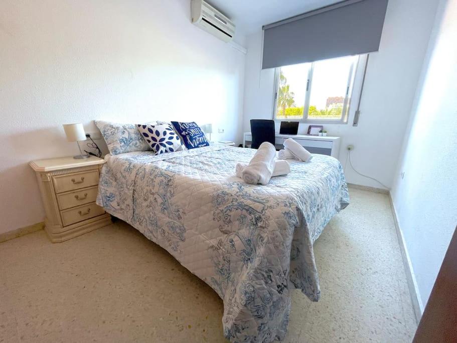 Posteľ alebo postele v izbe v ubytovaní Millys House junto a Feria real