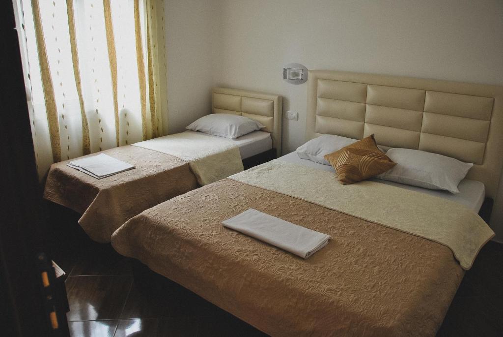 Postel nebo postele na pokoji v ubytování Lantana