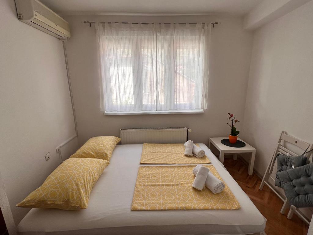 Postel nebo postele na pokoji v ubytování Guest House Kiwi Mostar