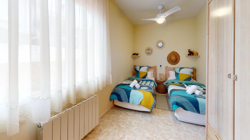 Postel nebo postele na pokoji v ubytování VILLA VALENTINA
