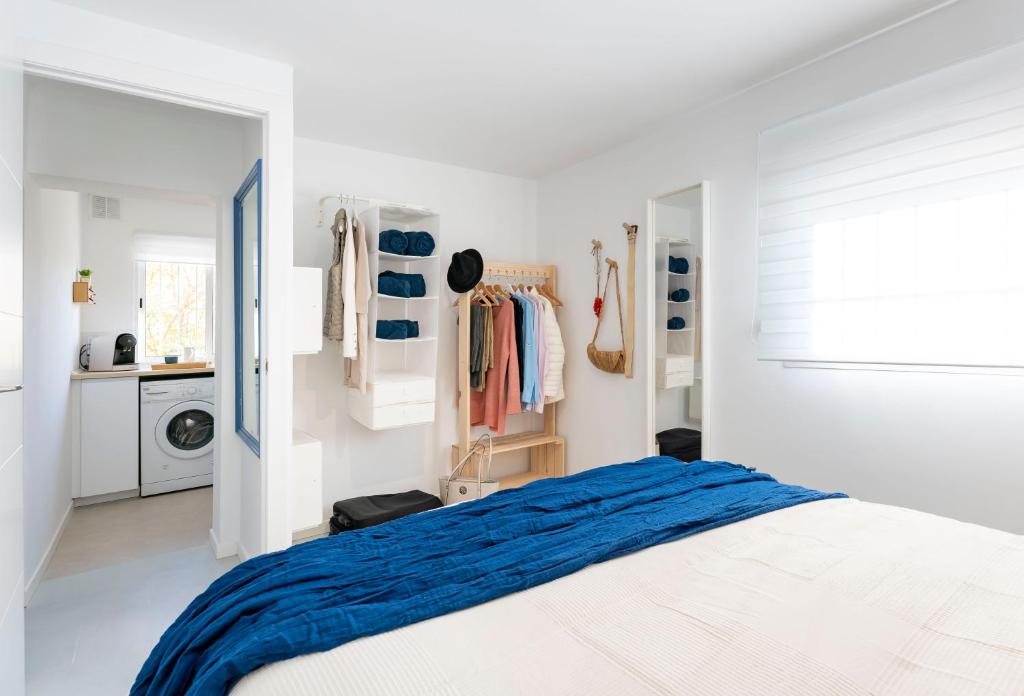 Posteľ alebo postele v izbe v ubytovaní Apartamento de un dormitorio cerca de la playa