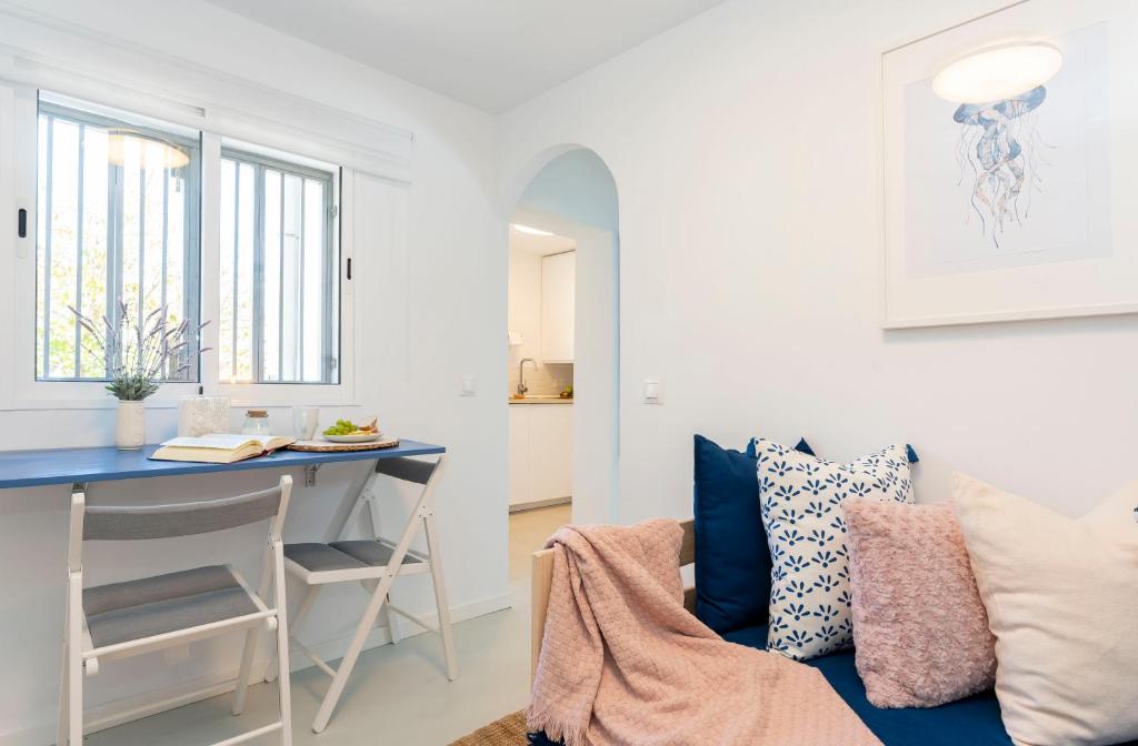 Posedenie v ubytovaní Apartamento de un dormitorio cerca de la playa