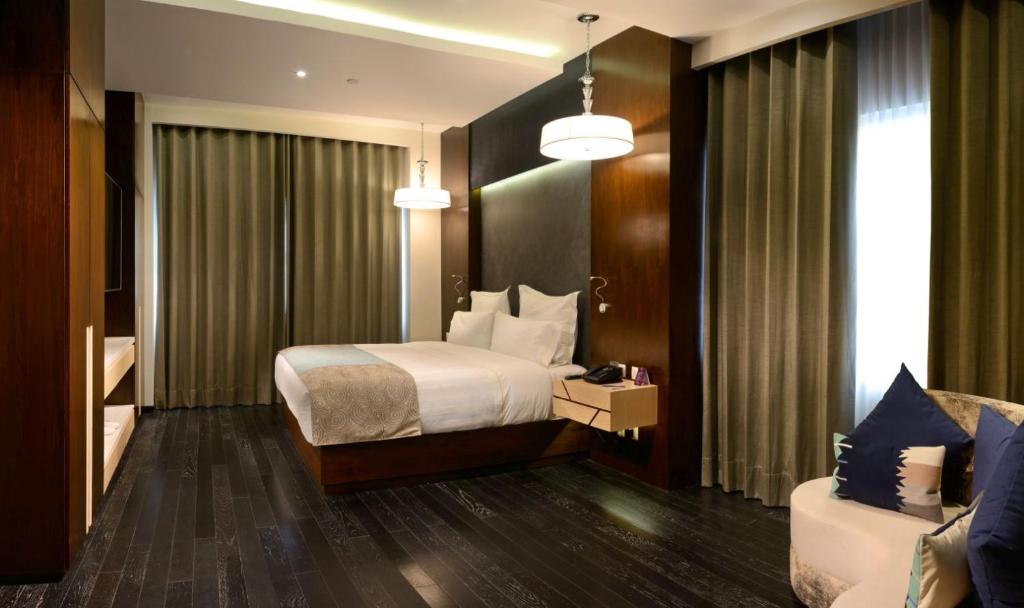 Postel nebo postele na pokoji v ubytování HS HOTSSON Hotel Irapuato