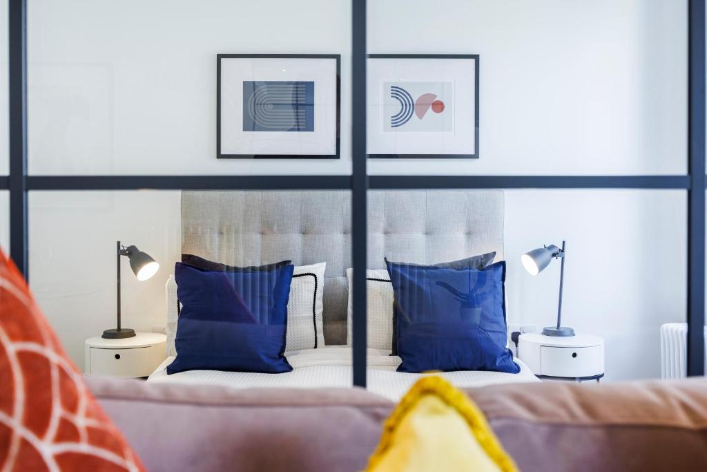 Ліжко або ліжка в номері Apartment Near Canary Wharf 02 Arena & Excel
