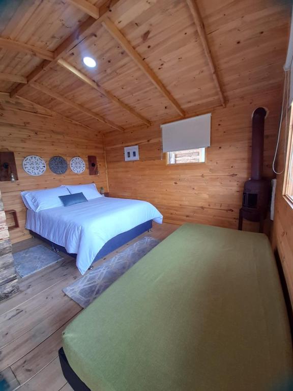 Postel nebo postele na pokoji v ubytování El Refugio del Santo