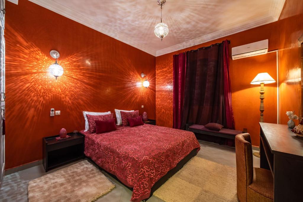 Postel nebo postele na pokoji v ubytování Riad Appart Arwa