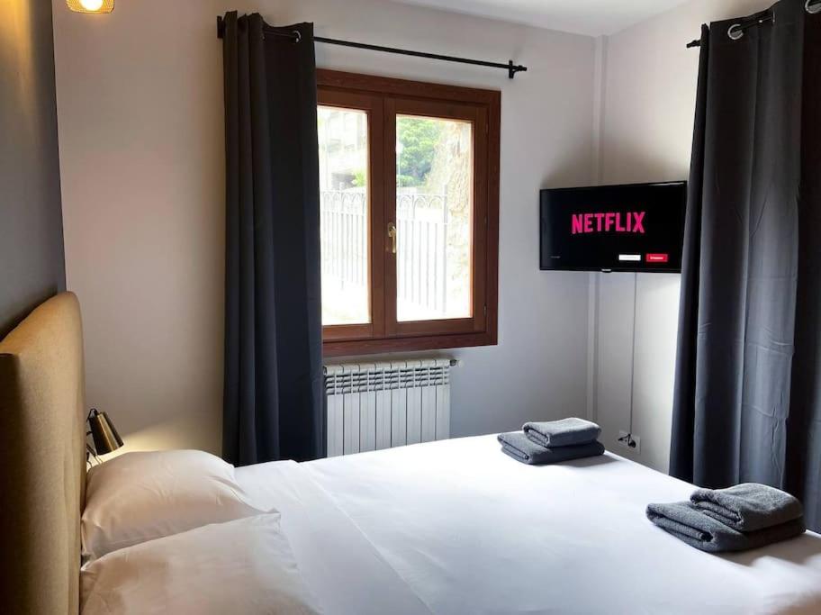 Postel nebo postele na pokoji v ubytování Moderno Y Rústico En Ransol 6pax l by BonesVacances