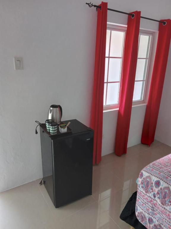 Voodi või voodid majutusasutuse Comfy Guest Rooms toas
