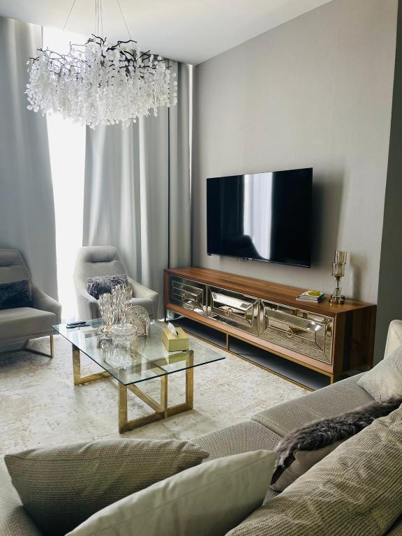TV a/nebo společenská místnost v ubytování ِALMABEET Resort