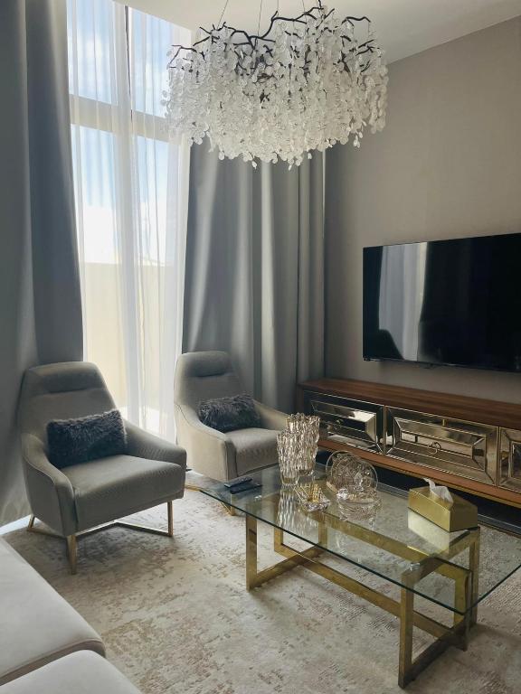 TV a/nebo společenská místnost v ubytování ِALMABEET Resort
