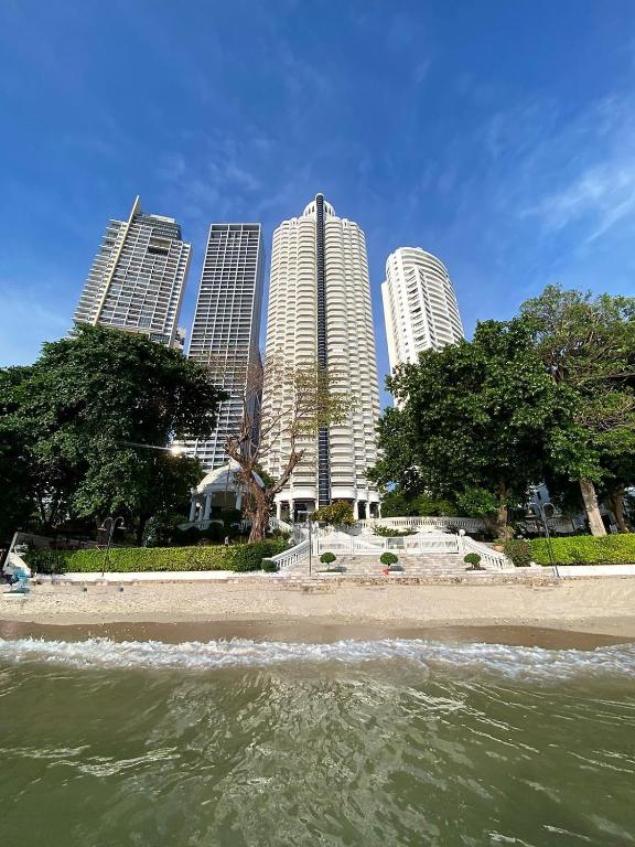 a view of a beach with buildings in the background at Sky Beach Pattaya in North Pattaya