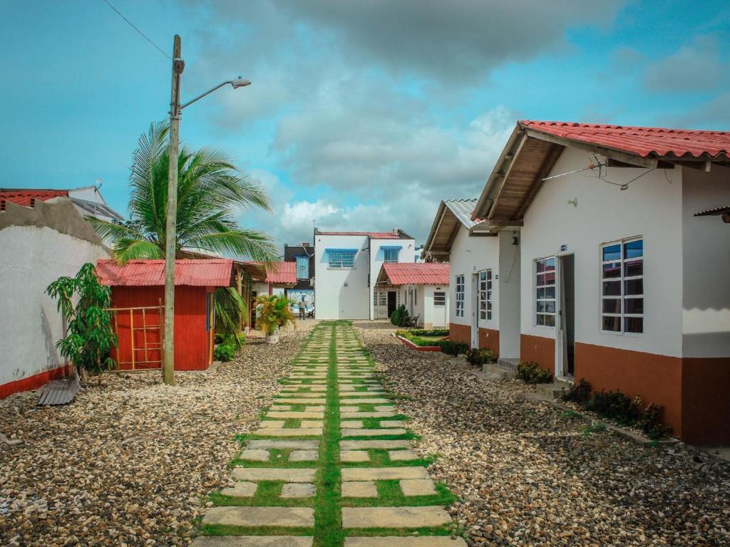 a street in a small town with houses at VALLE REAL in Turbo