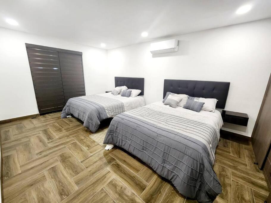 Postel nebo postele na pokoji v ubytování Departamento Pitagoras No 3