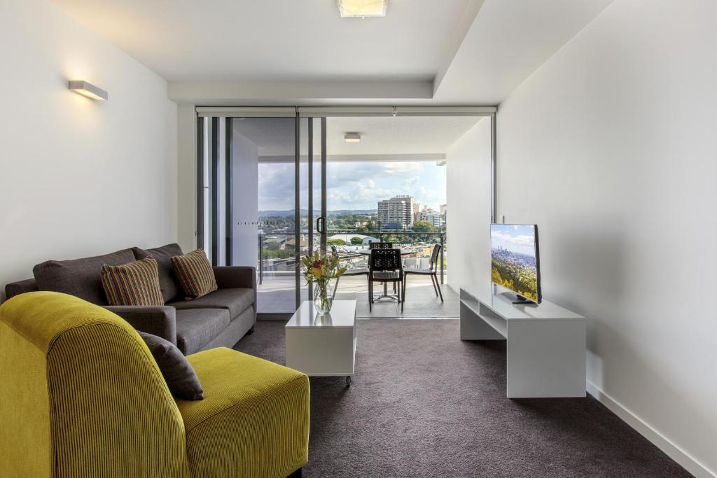 TV a/nebo společenská místnost v ubytování Code Apartments