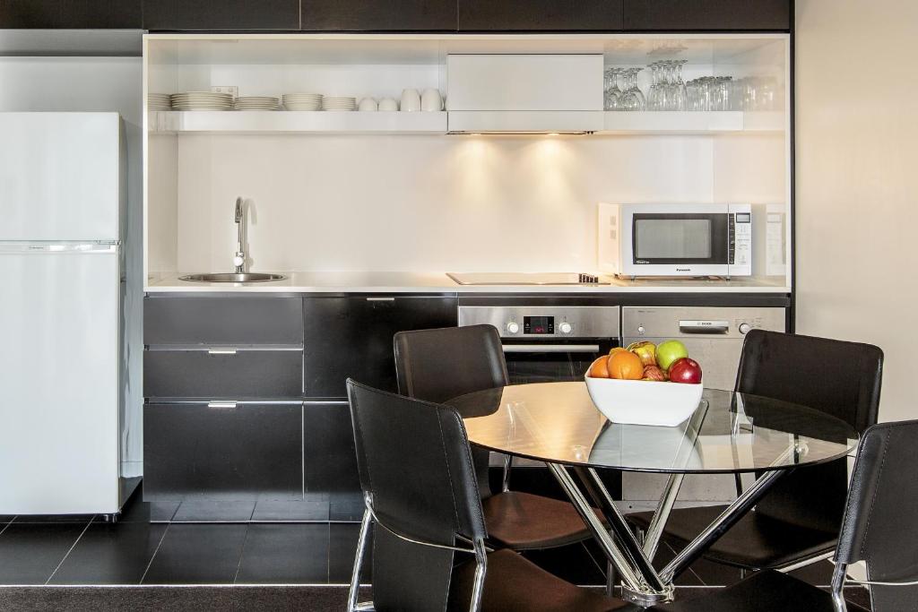 Kuchyň nebo kuchyňský kout v ubytování Code Apartments