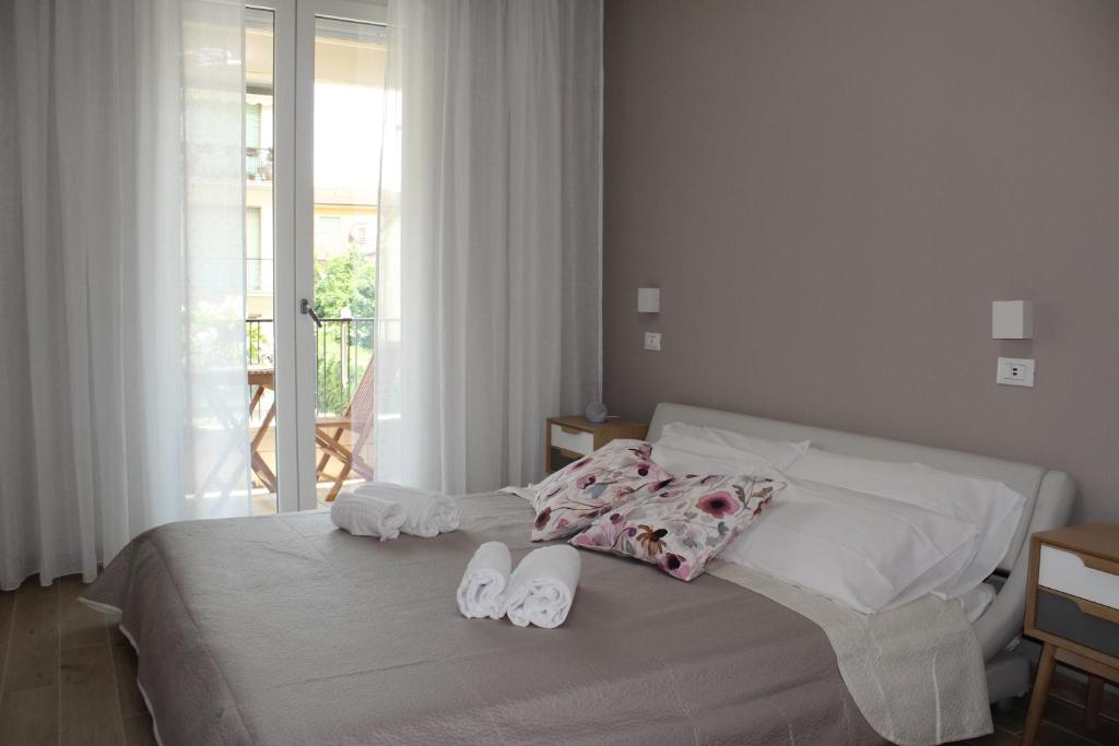 Postel nebo postele na pokoji v ubytování Aurora BnB