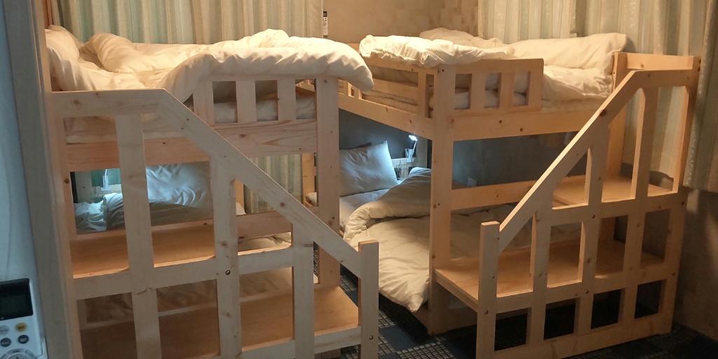 Postel nebo postele na pokoji v ubytování Guest Room安曇野2466