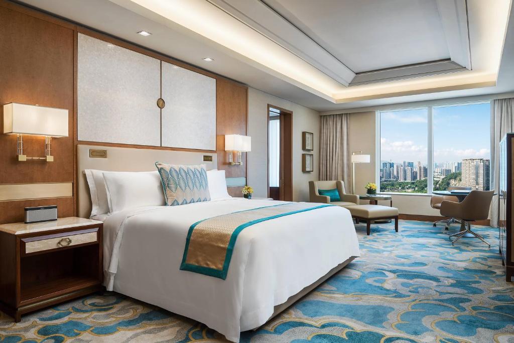 Postel nebo postele na pokoji v ubytování St. Regis Macao