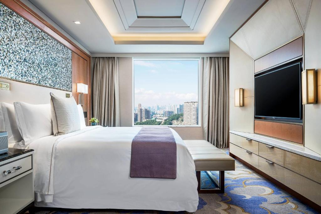 Postel nebo postele na pokoji v ubytování St. Regis Macao