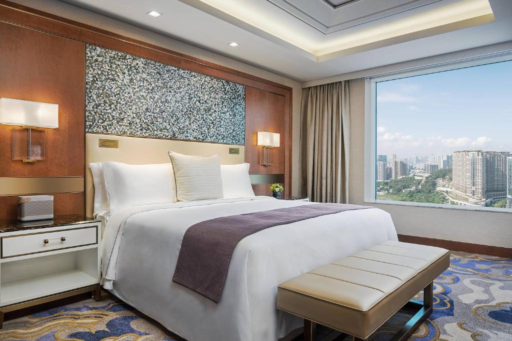 Postel nebo postele na pokoji v ubytování St. Regis Macao
