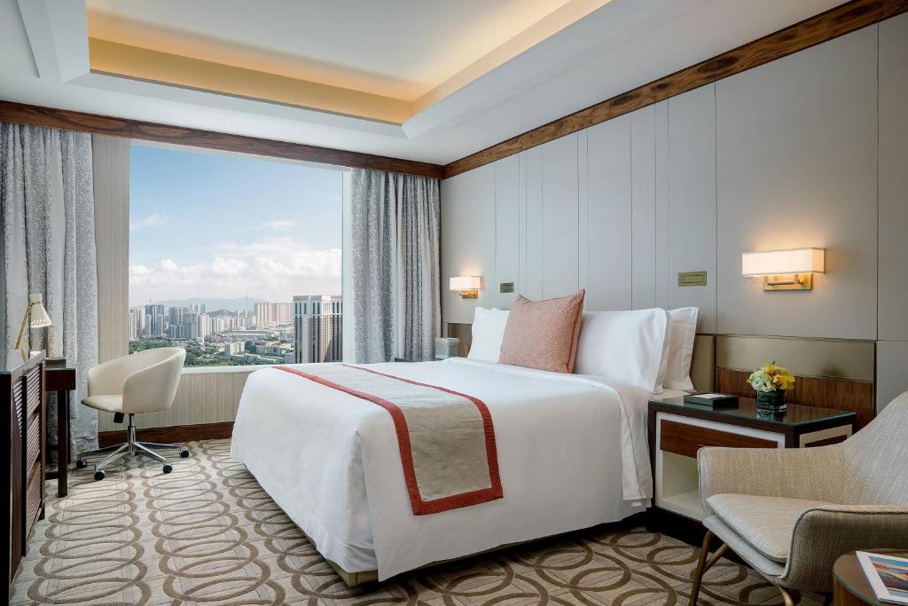 Postel nebo postele na pokoji v ubytování St. Regis Macao