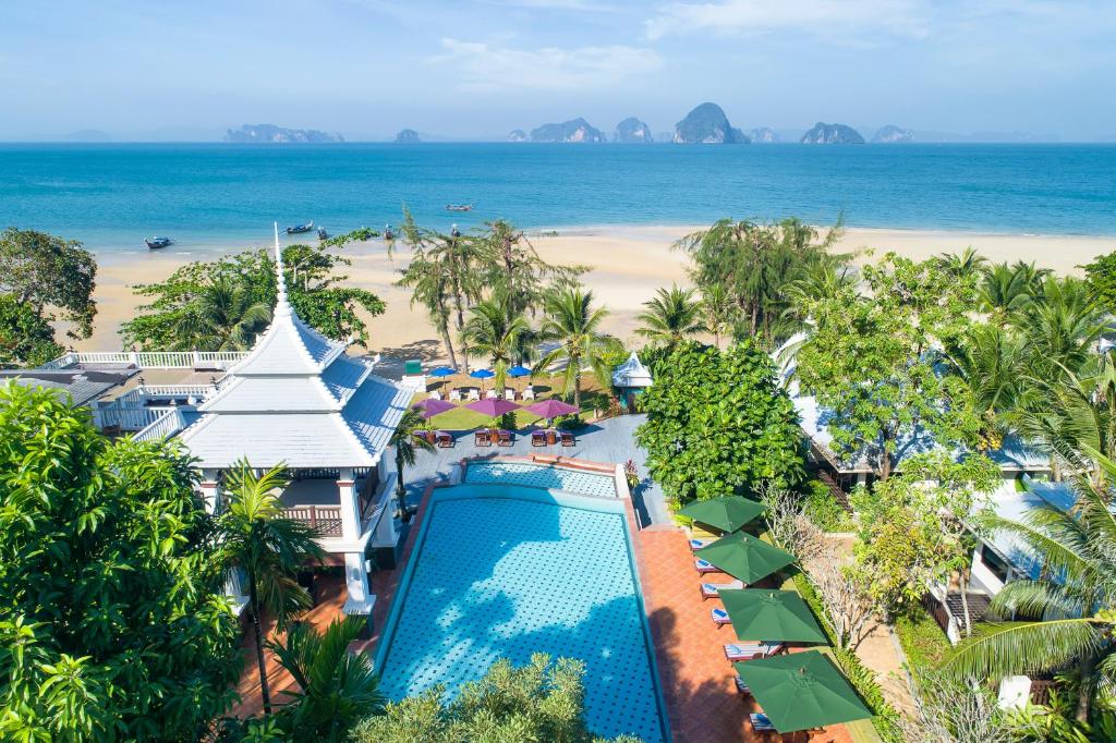 an aerial view of a resort with a pool and the beach at Anyavee Tubkaek Beach Resort in Tab Kaek Beach