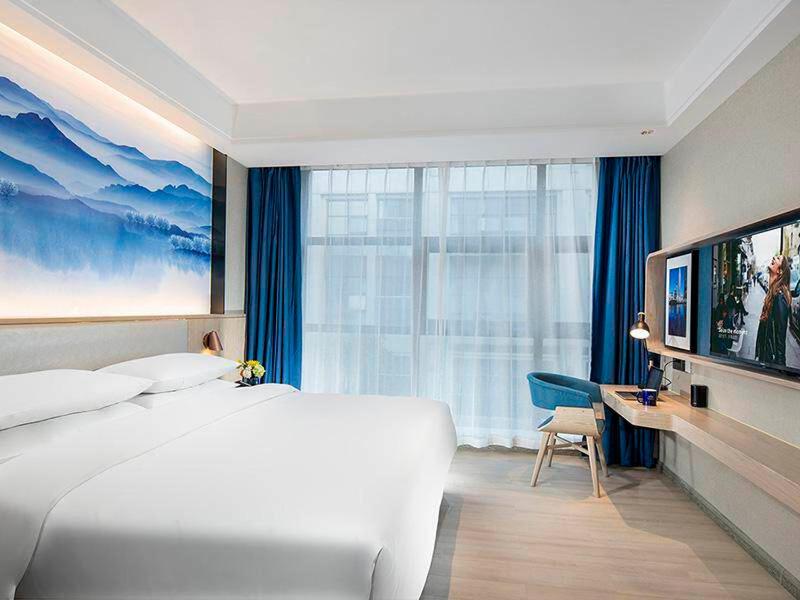 Kyriad Hotel Luoyang Longmen Railway Station - Premier Suite