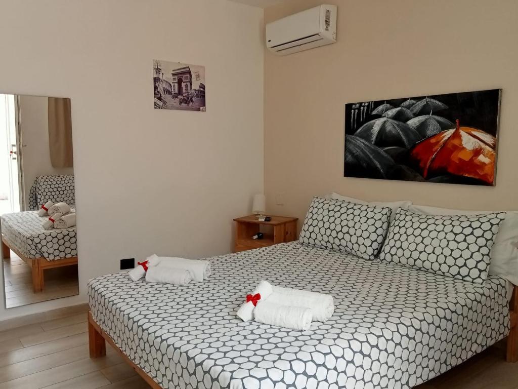 Posteľ alebo postele v izbe v ubytovaní Il Daviduccio Suite