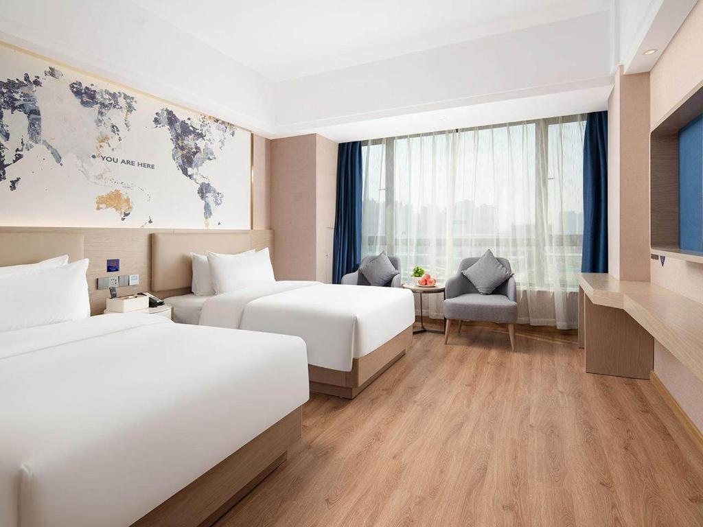 Kyriad Hotel Guigang Wuyue Plaza Railway Station - Premium Twin Room With City View