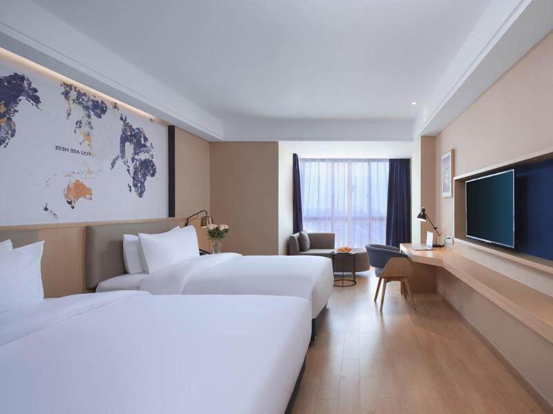 Kyriad Marvelous Hotel Suzhou Wujiang People Square - Digitale Tweelingzaal