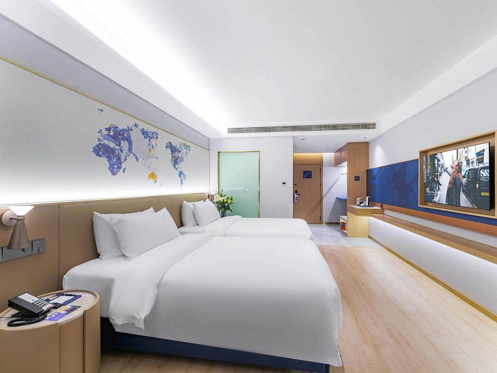 Kyriad Hotel Jiujiang Happy City - Honorable Sala Gemela