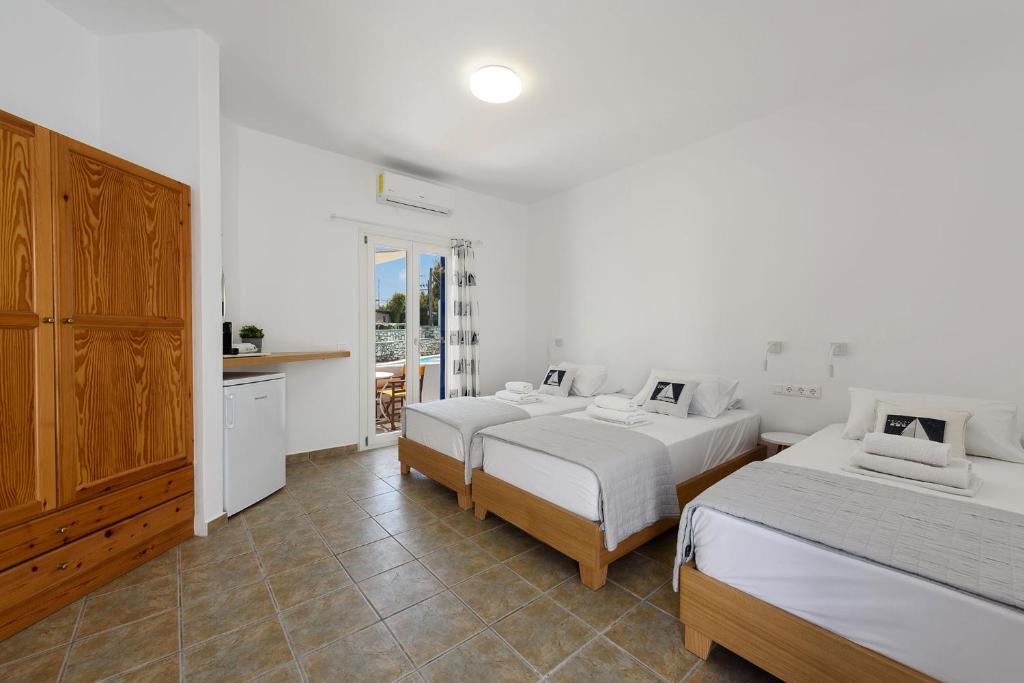 Postel nebo postele na pokoji v ubytování Hotel Bilia