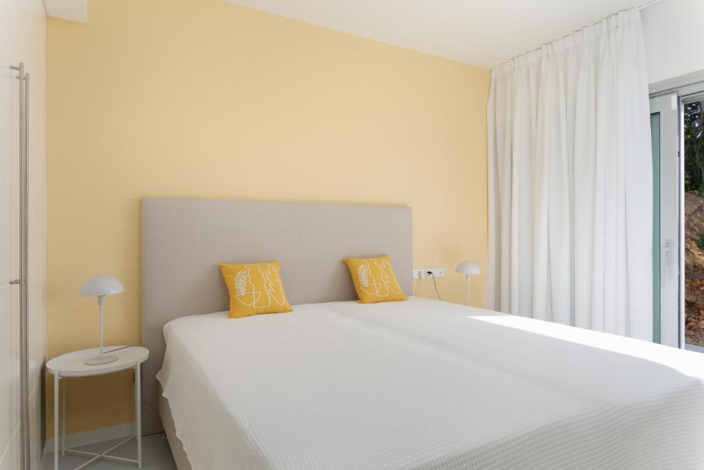 Postel nebo postele na pokoji v ubytování VILLA CELIMAR
