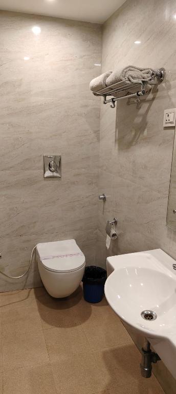 Koupelna v ubytování Hotel Krishna