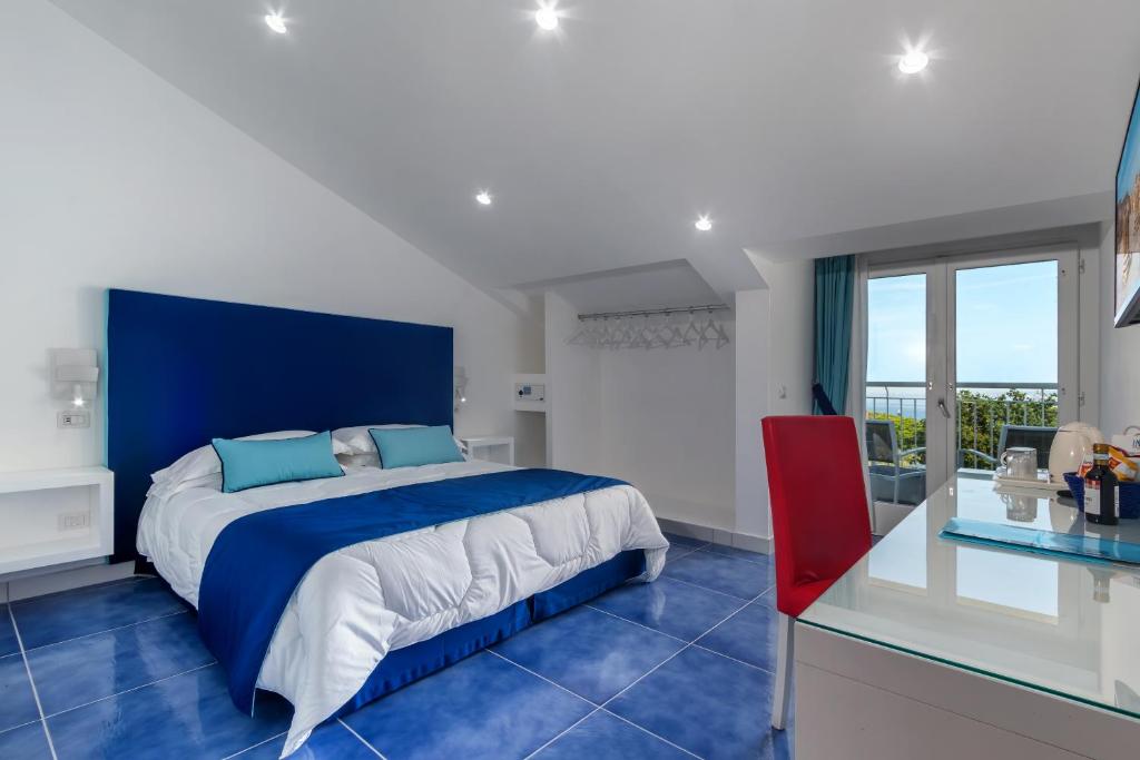 Postel nebo postele na pokoji v ubytování Hotel Metropole