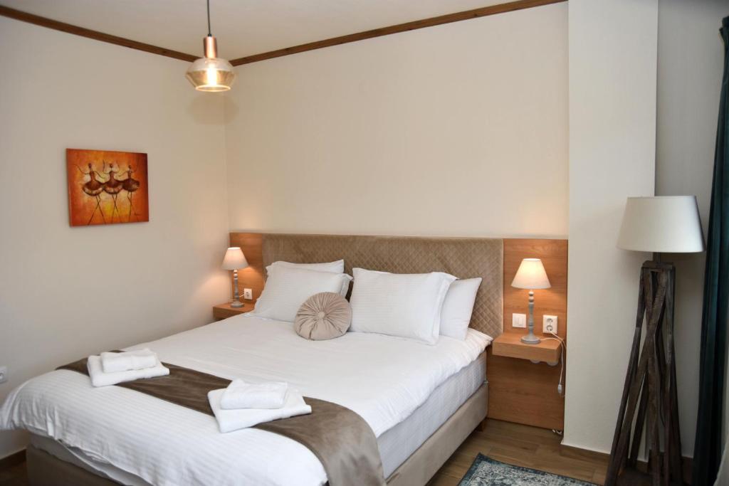 Postel nebo postele na pokoji v ubytování NUCA GUESTHOUSE