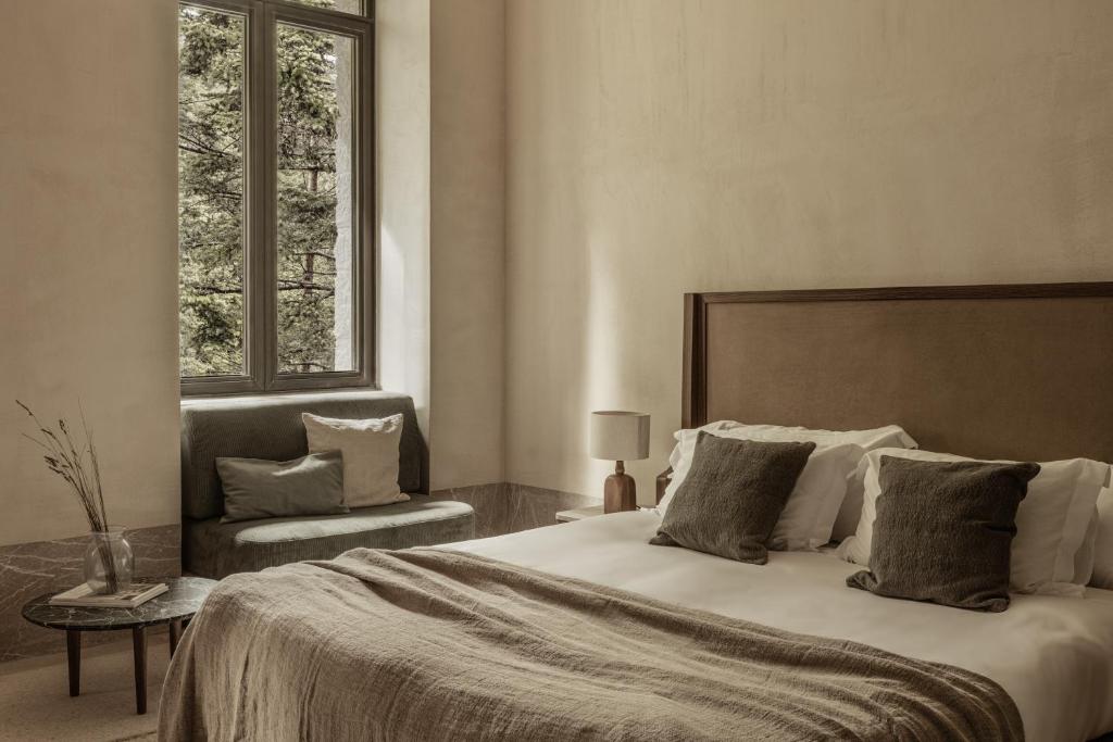 Postel nebo postele na pokoji v ubytování MANNA, a Member of Design Hotels