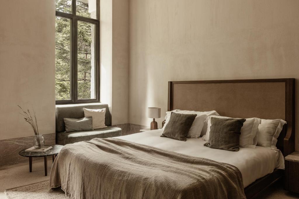Postel nebo postele na pokoji v ubytování MANNA, a Member of Design Hotels