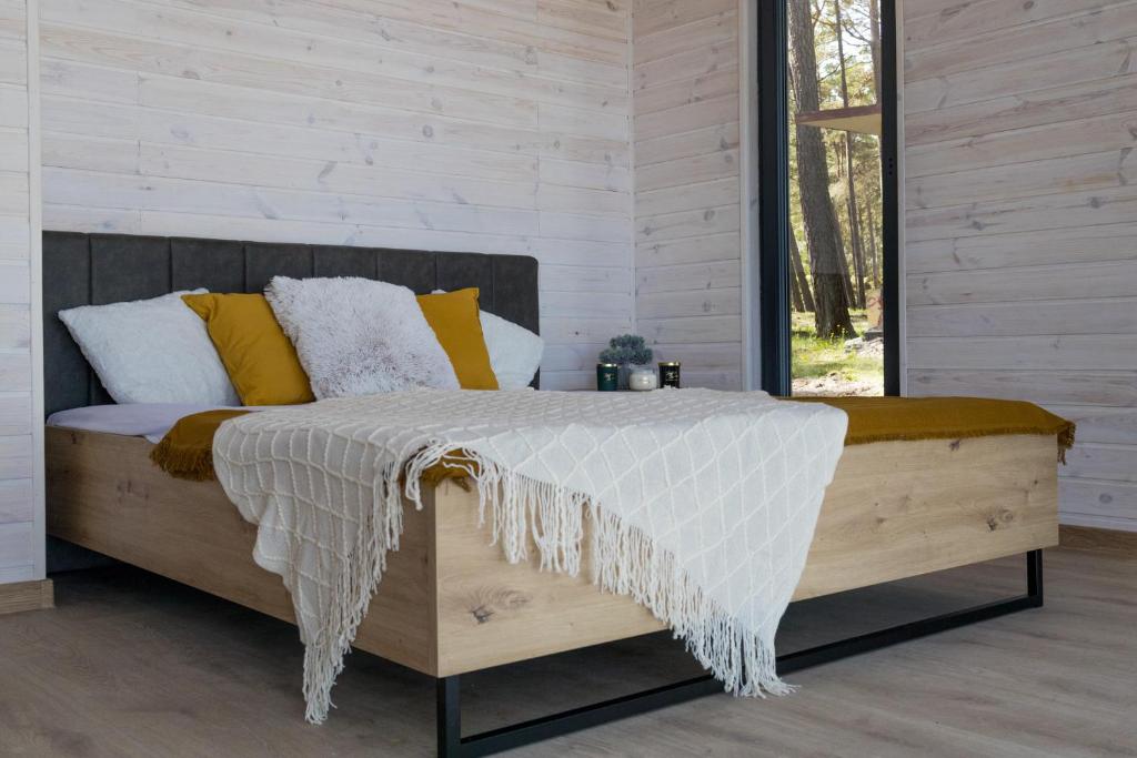 Postel nebo postele na pokoji v ubytování Ustronie Park - beach resort