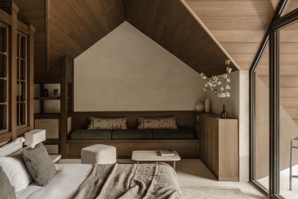 Postel nebo postele na pokoji v ubytování MANNA, a Member of Design Hotels