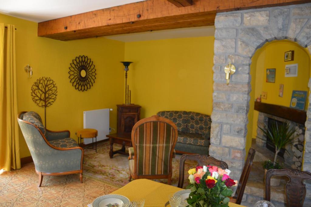 Posezení v ubytování Moulin de la Cuse - Chambre La Cuse