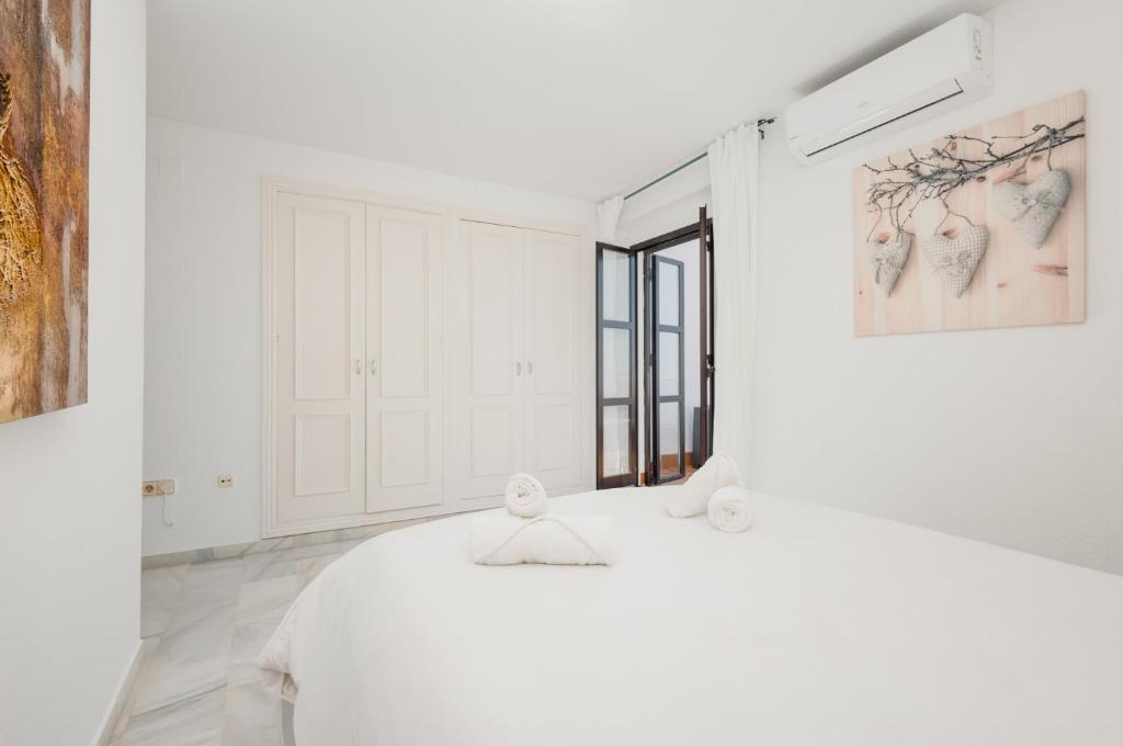 Posteľ alebo postele v izbe v ubytovaní Penthouse in Puerto Banus with sea and marina views